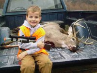 Evan and dad's deer.jpg